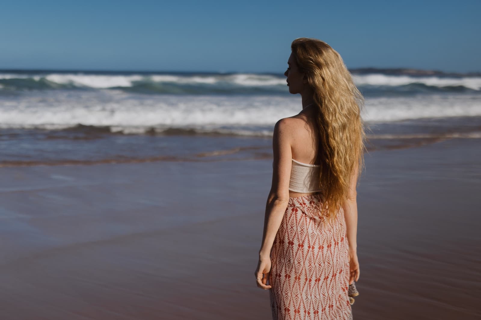 Scarlett Wolf at the ocean's edge — Tantric massage practitioner for men in Sydney